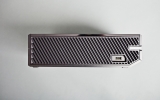 <p>The side closer to the optical drive, with a USB 3.0 jack.